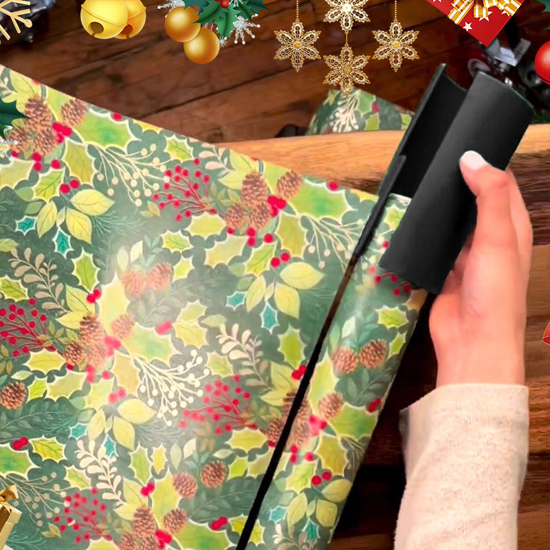 "Musta/vihreä käärepaperileikkuri lastentuotteille, liukuva rakenne, terävä terä sujuvaan ja tarkkaan lahjapakkaamiseen."