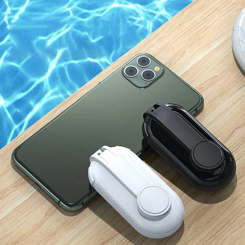 "3-in-1 matkailijan puhelinlaturi, kompakti ja kevyt, musta, punainen ja valkoinen, matkustamiseen ja nopeaan lataukseen."