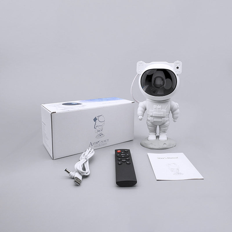Astronautin muotoinen LED-yövalo tähtiprojektorilla aikuisille, säädettävä kirkkaus ja pyörivä tähtitaivas.