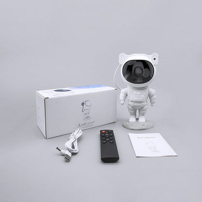 Astronautin muotoinen LED-yövalo tähtiprojektorilla aikuisille, säädettävä kirkkaus ja pyörivä tähtitaivas.