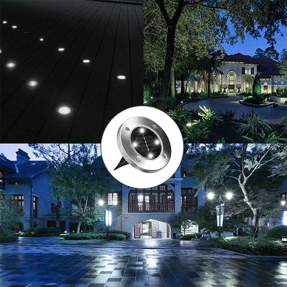 "Aurinkoenergialla toimivat LED-polkuvalot puutarhaan, hopeinen runko, lämpimän valkoiset LEDit, istutettuna nurmikolle."