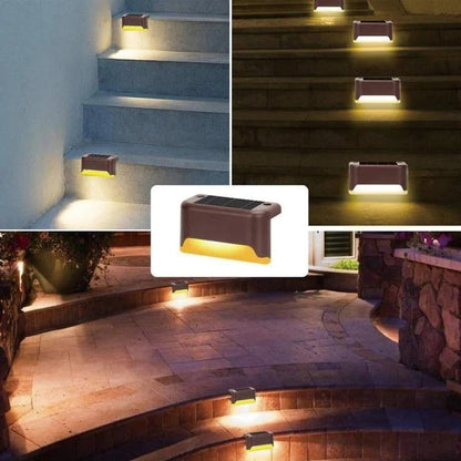 "Aurinkovoimainen musta terassivalo, lämmintä sävyä, vesitiivis, moderni muotoilu ulkokäyttöön."