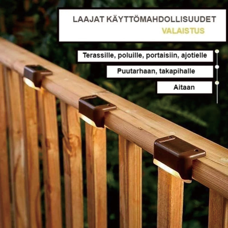 "Aurinkovoimainen musta terassivalo, lämmintä sävyä, vesitiivis, moderni muotoilu ulkokäyttöön."