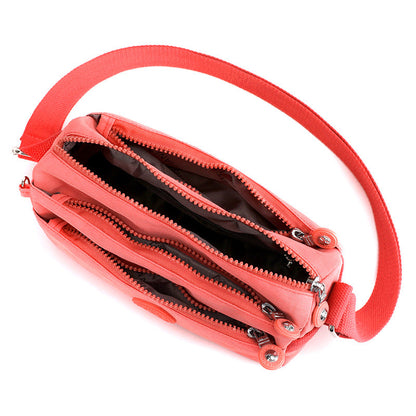 "Elegantti, kevyt monikerroksinen naisten olkalaukku useilla taskuilla ja värivaihtoehdoilla, sopii arkeen ja juhlaan."