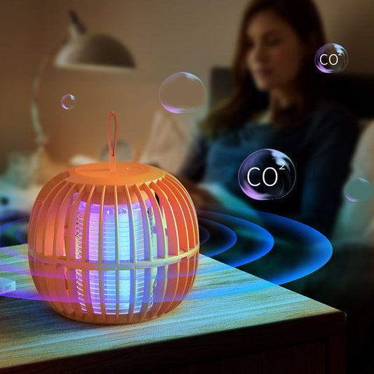 "Kurpitsan muotoinen äänetön 2 in 1 hyönteisloukkuvalo violeteilla LED-valoilla ja USB-latauksella."