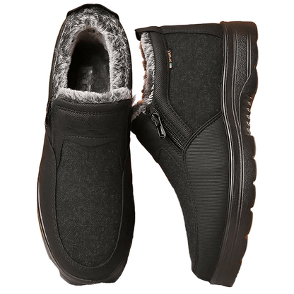 "Miesten vedenpitävät talvikengät, paksu vuori, ruskea lehmännahka, liukumaton pohja, sivulta kuvattuna"