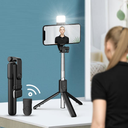"Musta/valkoinen 6-in-1 langaton Bluetooth selfietikku tripod, kestävä ja kevyt muotoilu, monikäyttöinen valokuvaukseen."